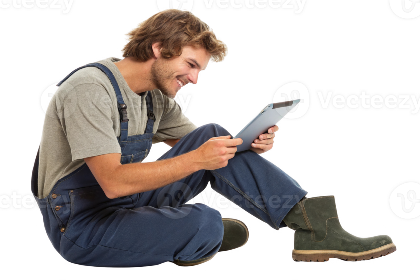 young man in overalls using tablet, showcasing blend of food and technology in modern work environments png
