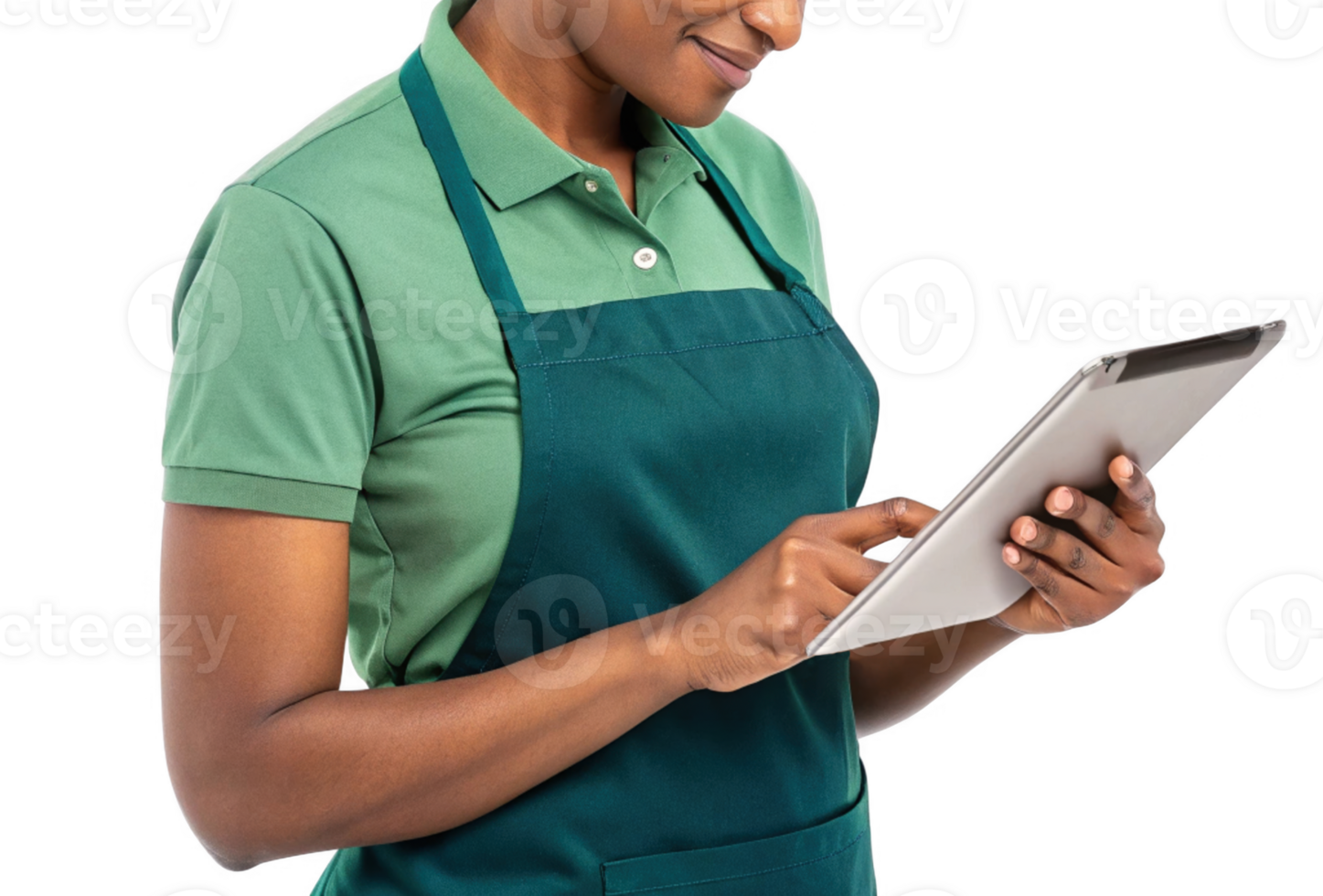 person in green shirt and apron using tablet, showcasing intersection of food and technology in professional setting png