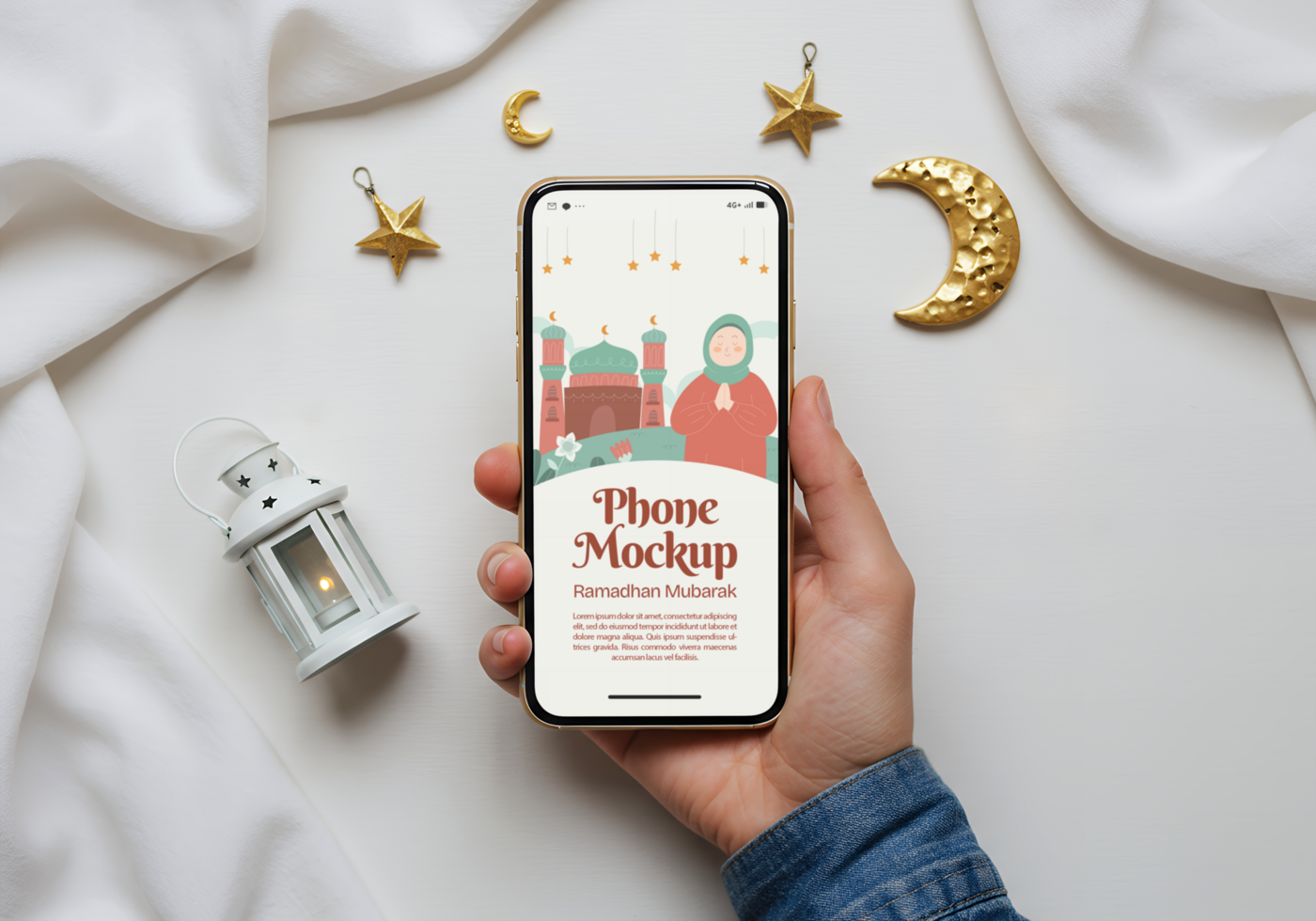 A hand holds a phone displaying a Ramadan Mubarak phone mockup design psd