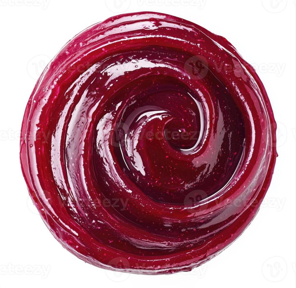 Swirl of berry jam isolated on white background, top view photo