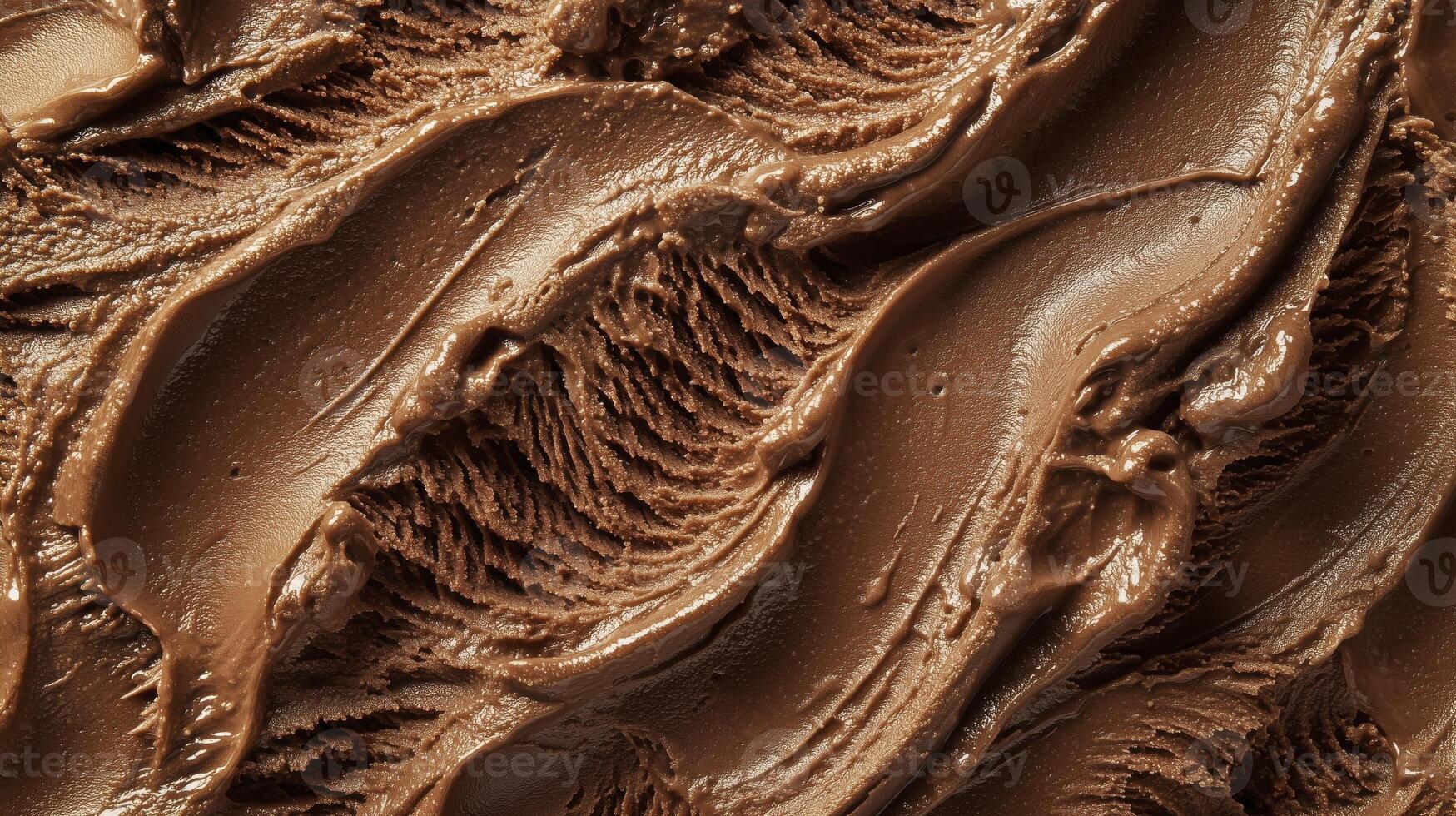 Chocolate ice cream with rich creamy texture and smooth swirls in close up view photo