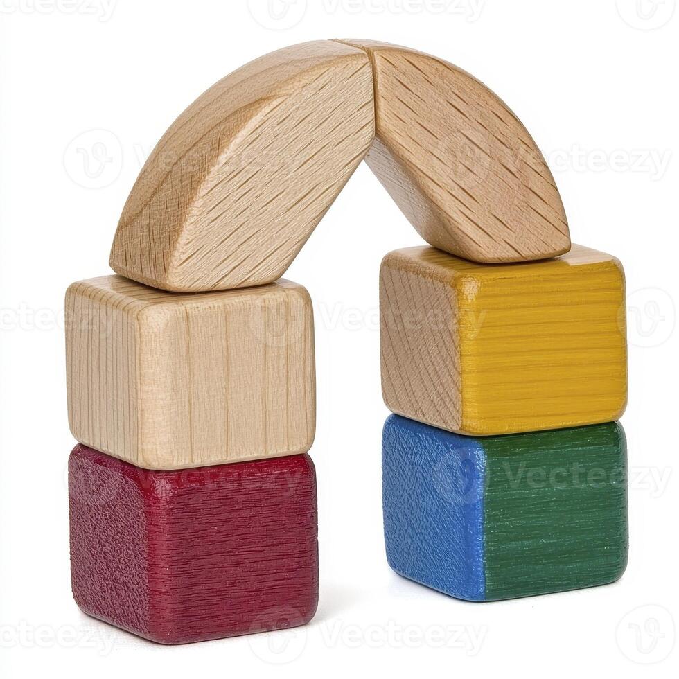 A wooden toy building block with different colors photo