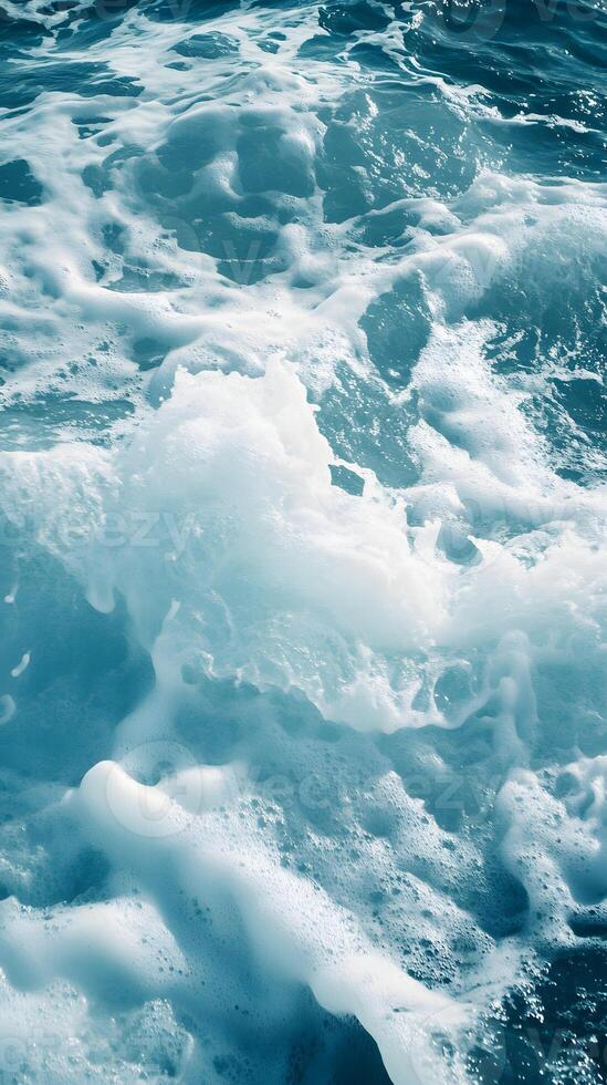 A person on a surfboard riding a wave photo
