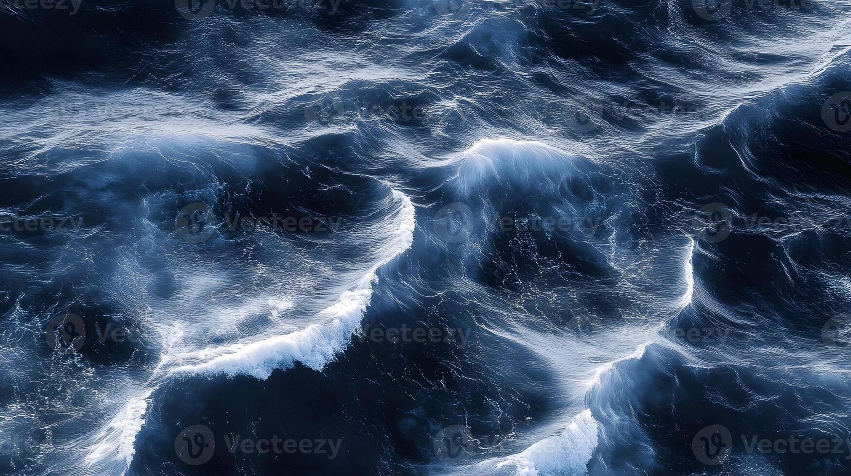 A large ocean wave with white and black waves photo