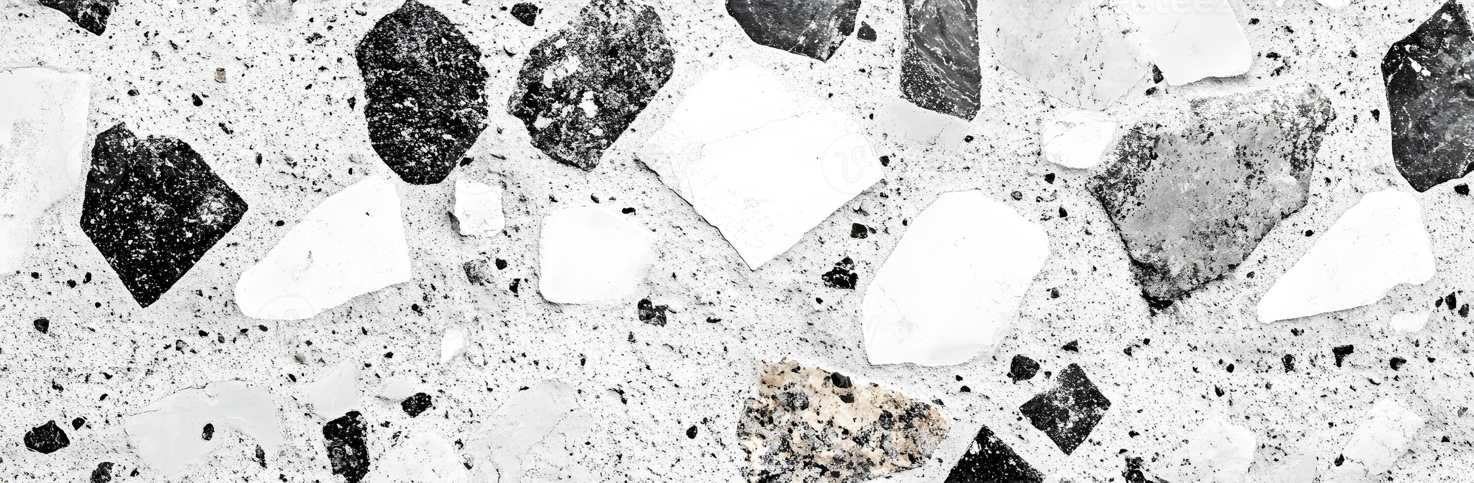 A black and white photo of a wall with many different shapes