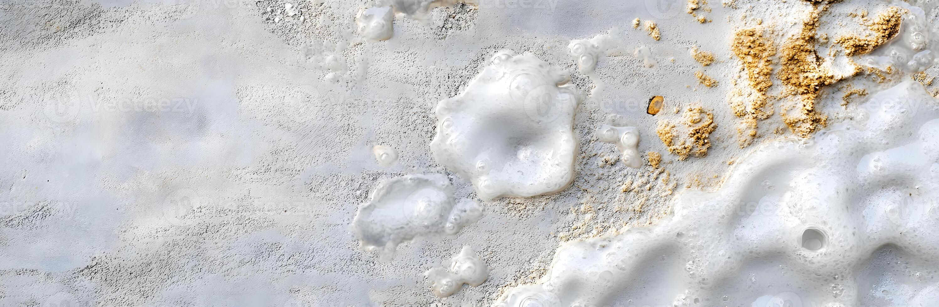 A close up of a white wall with some paint on it photo