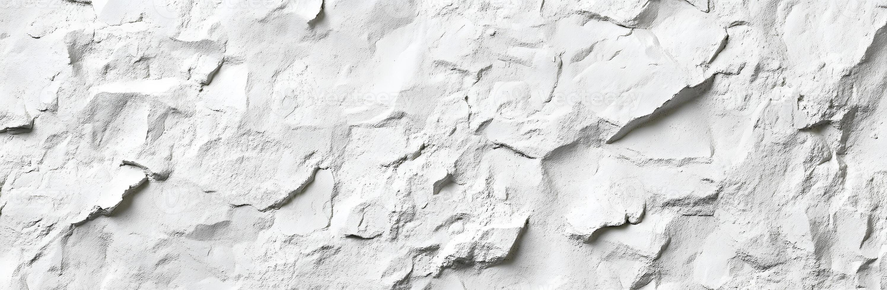 A close up of a white wall with paint photo