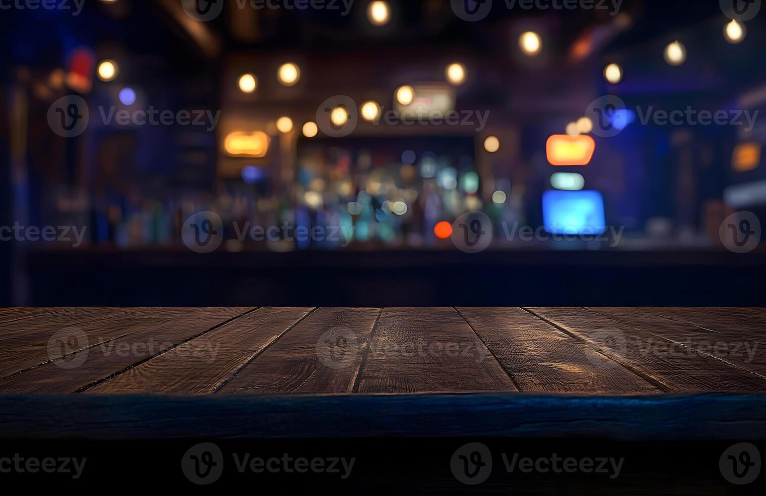 Wooden table top in front of a bar photo