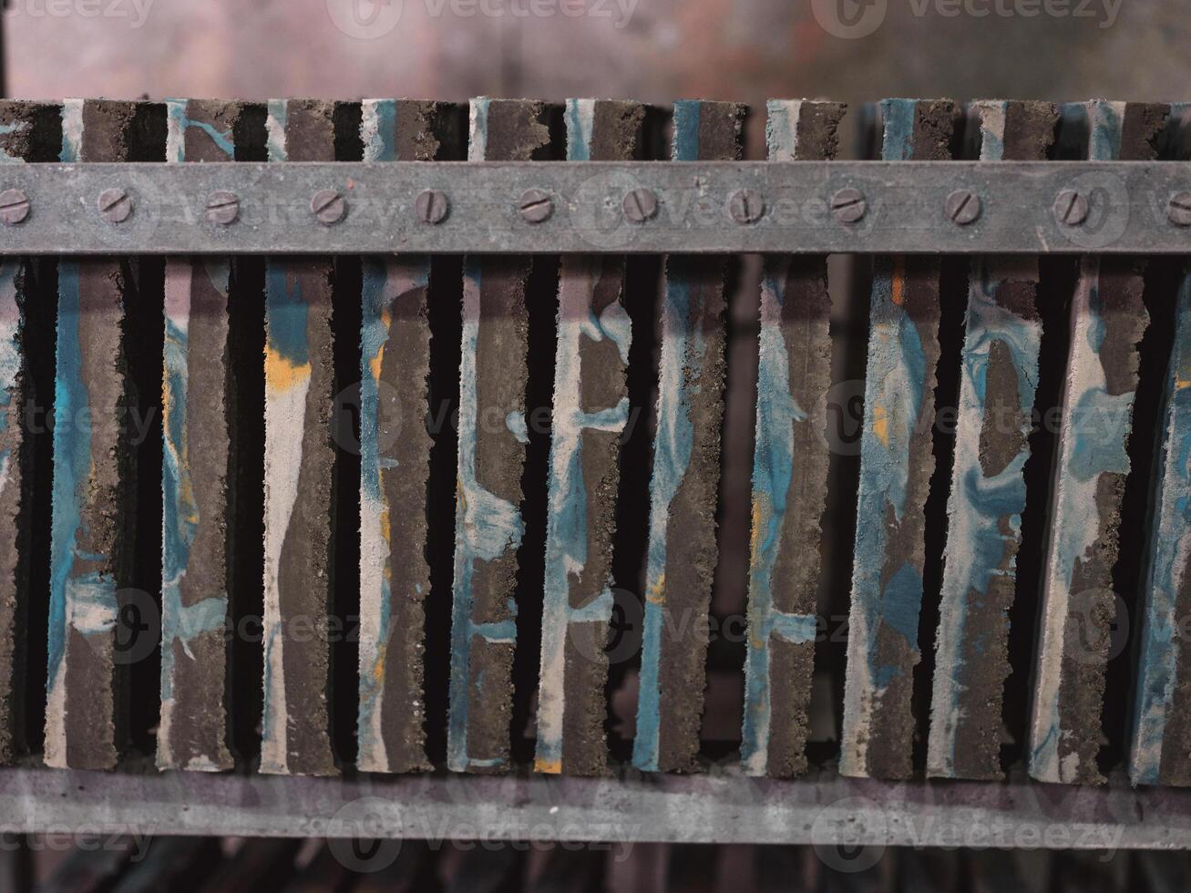Row of ornamental tiles on shelf photo