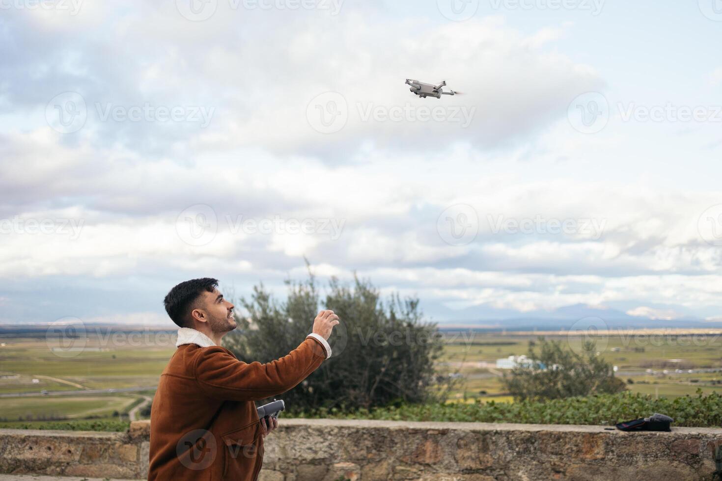 Photographer catching drone photo