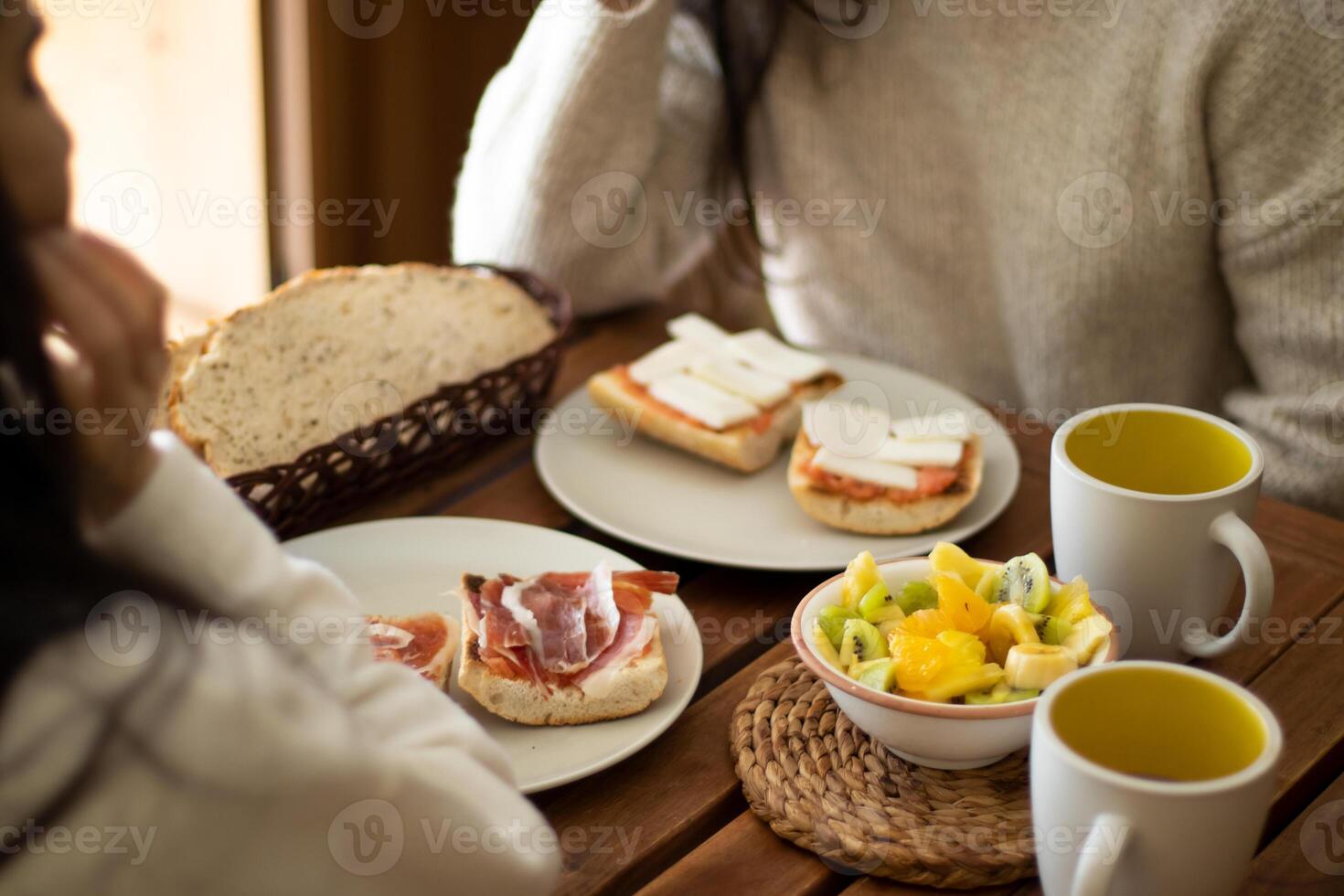Spanish breakfast with serrano ham and fruit at home. photo