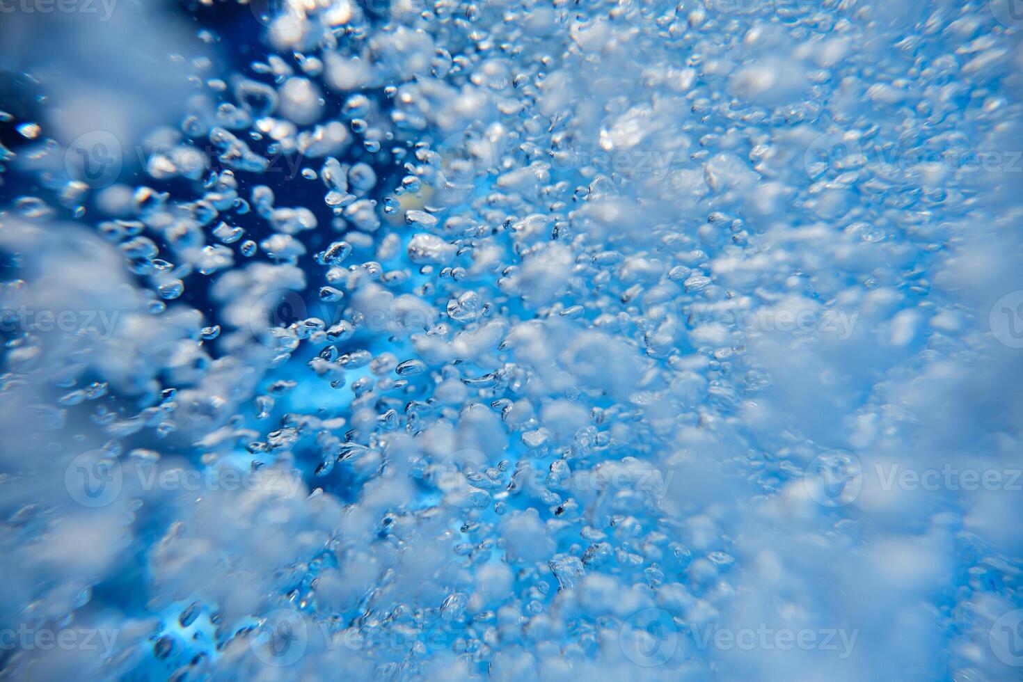 Abstract background of blue bubbles photo