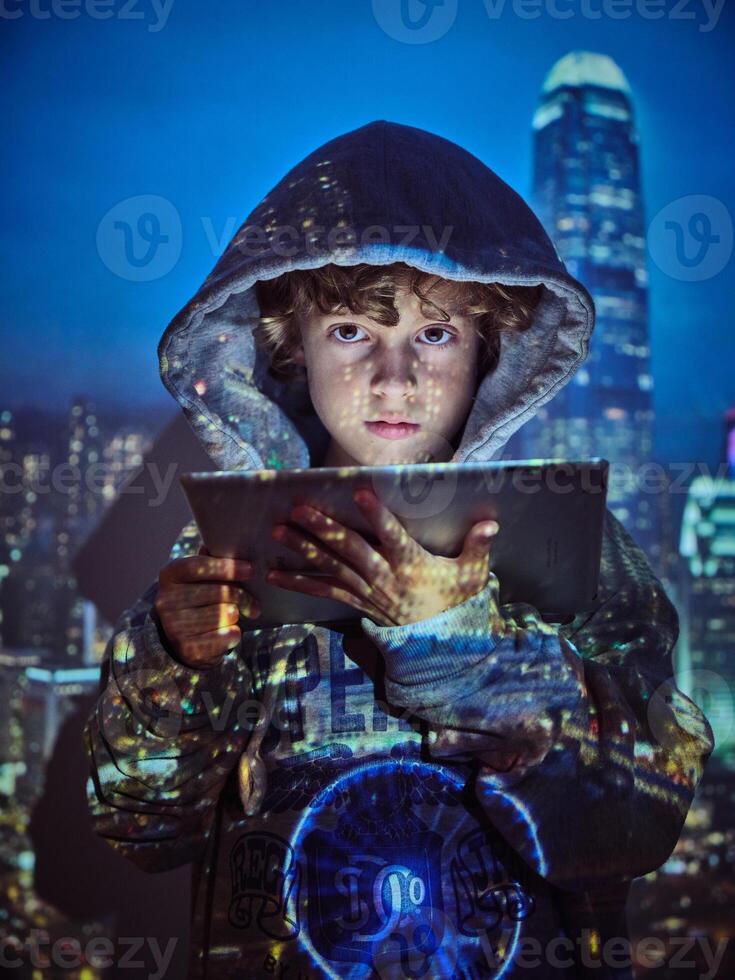 Boy with tablet in city projection photo