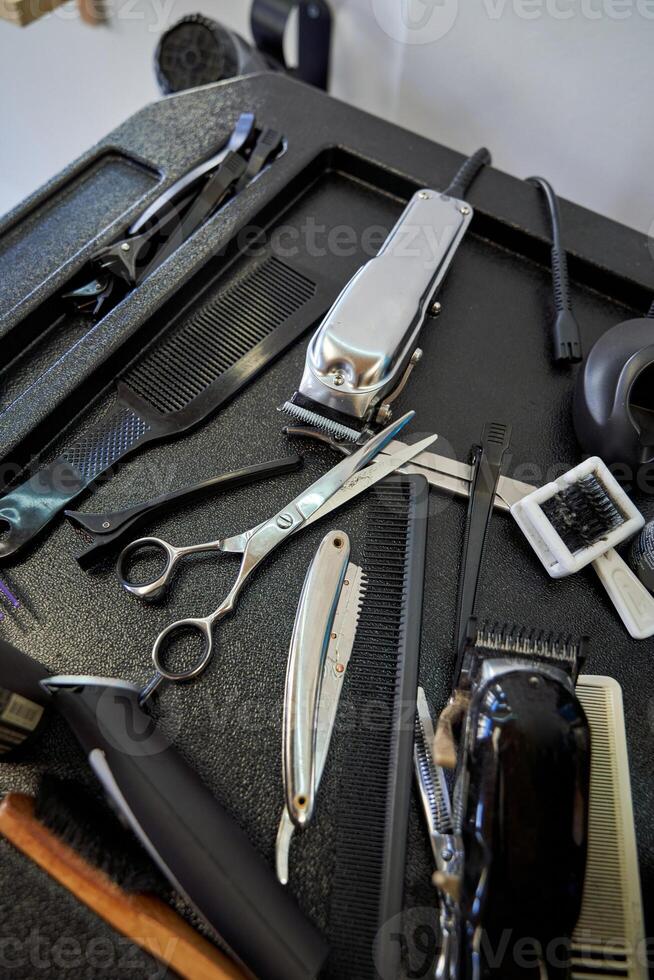 Professional instruments in light barbershop photo