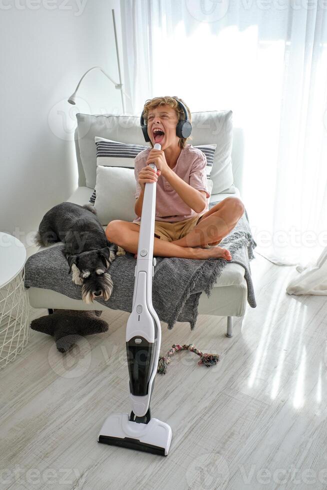 Boy singing while doing household routine photo