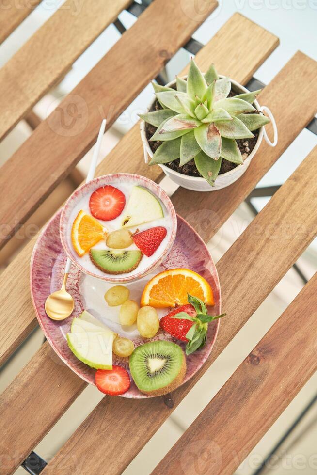 Mix of fruits with yogurt photo