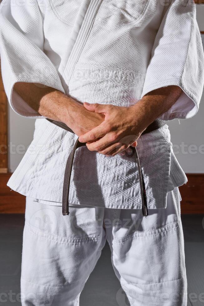 Anonymous man standing in kimono photo