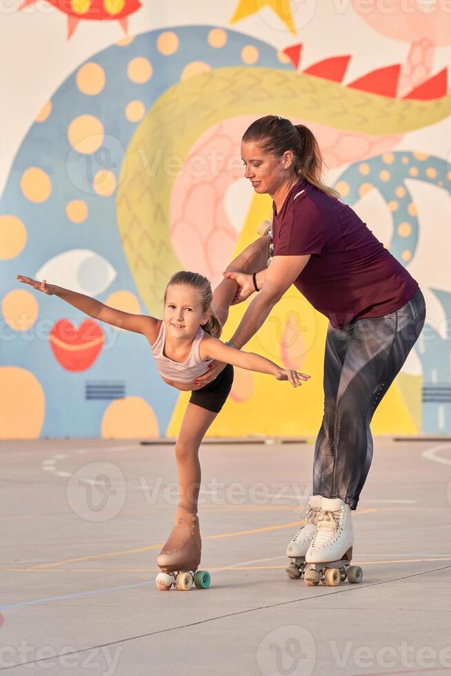 Active instructor training child to roller skating photo