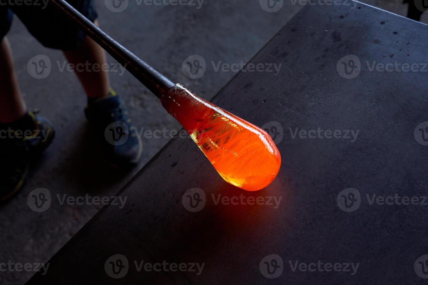 Crop master with melted glass on blow tube photo