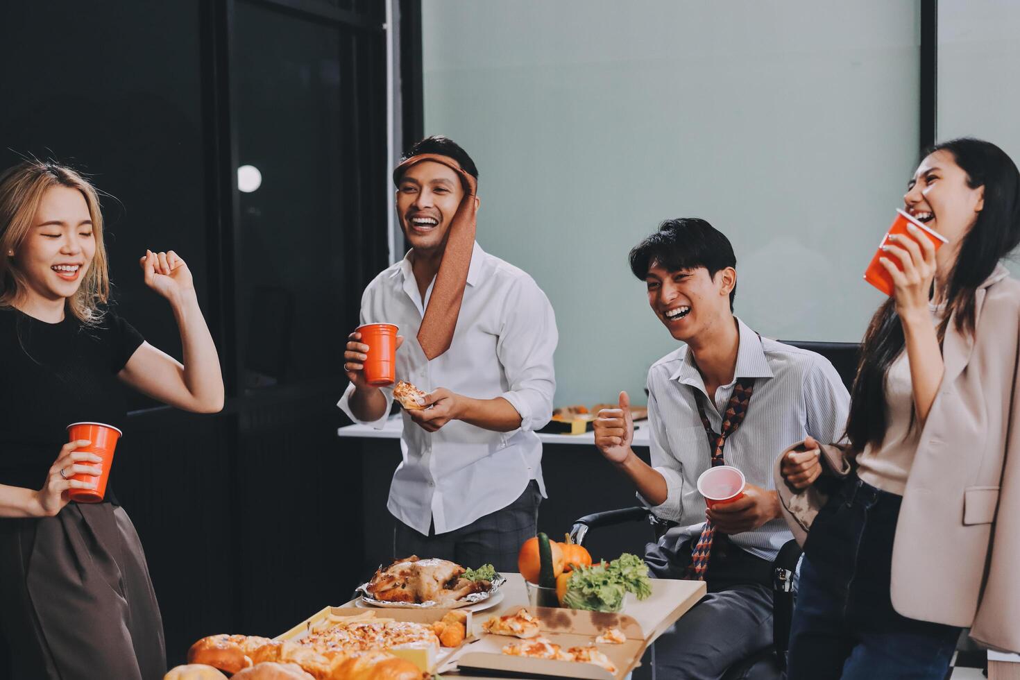 Group of young people having lunch together photo