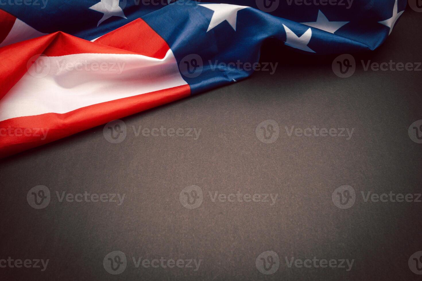 Part of the American flag is on a black background with copy space for text photo
