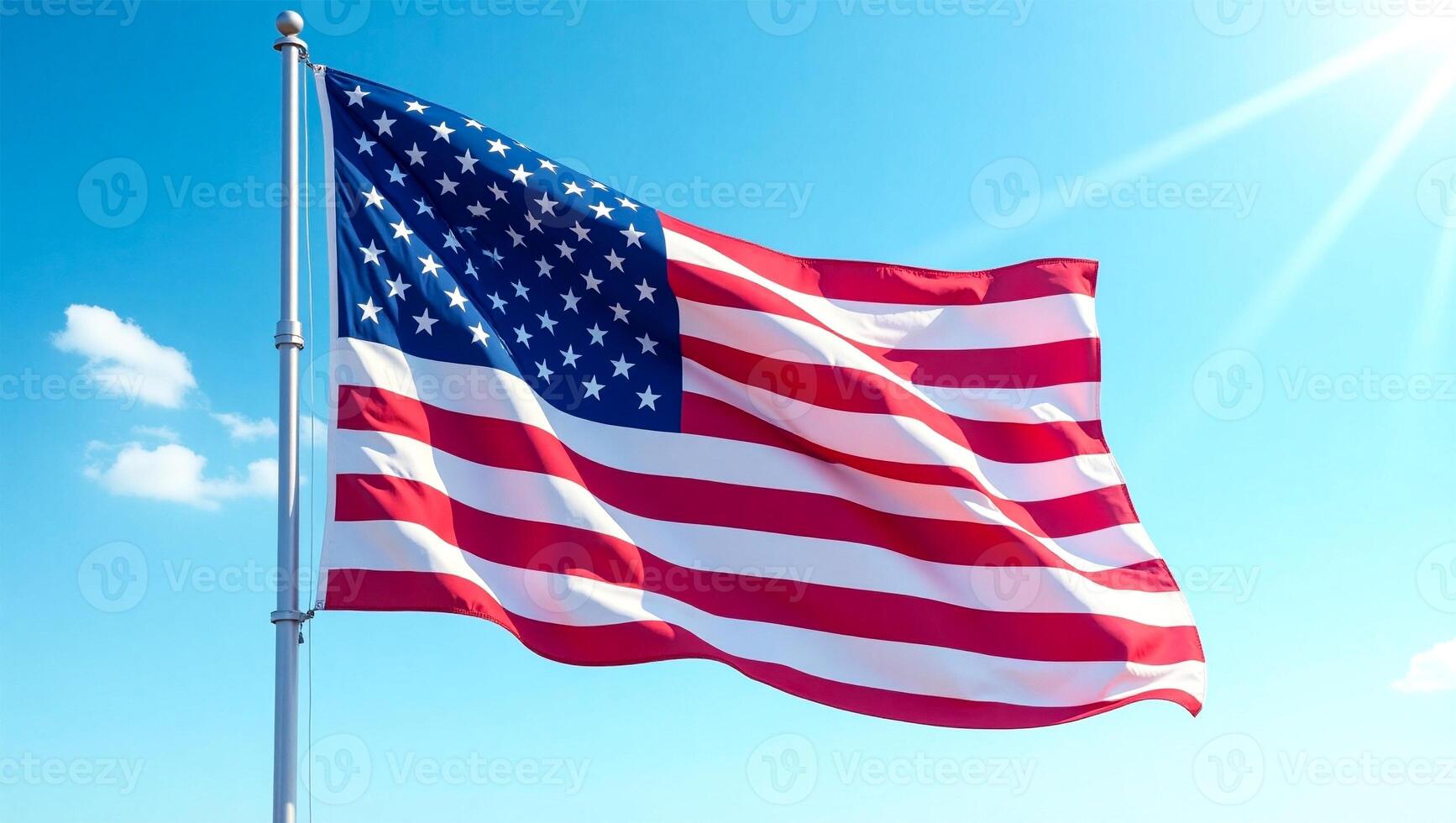 American Flag Waving in Bright Blue Sky photo
