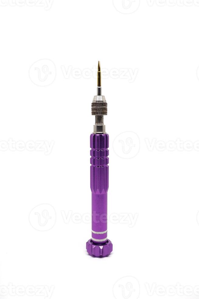 A purple screwdriver on white solid background photo