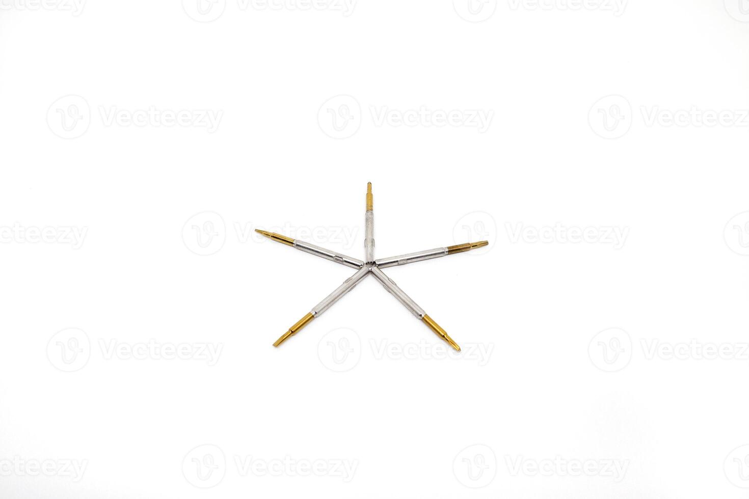 A star shaped object with four needles on it photo