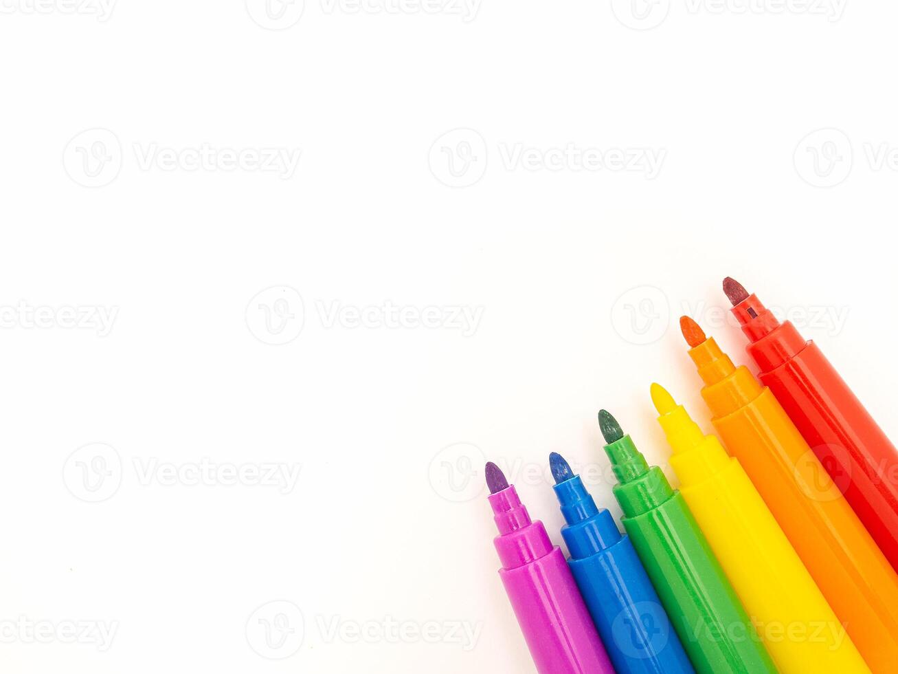 Top view of watercolor pens on a white background. photo