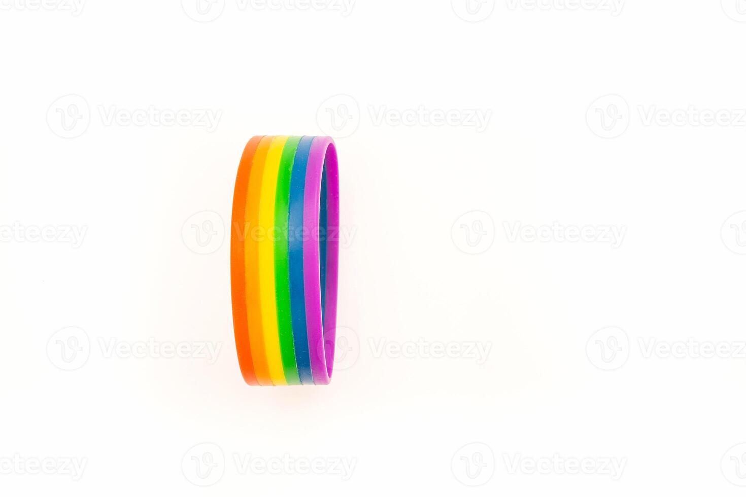 Rainbow patterned wristband on a white background. Top view. Space for text. photo
