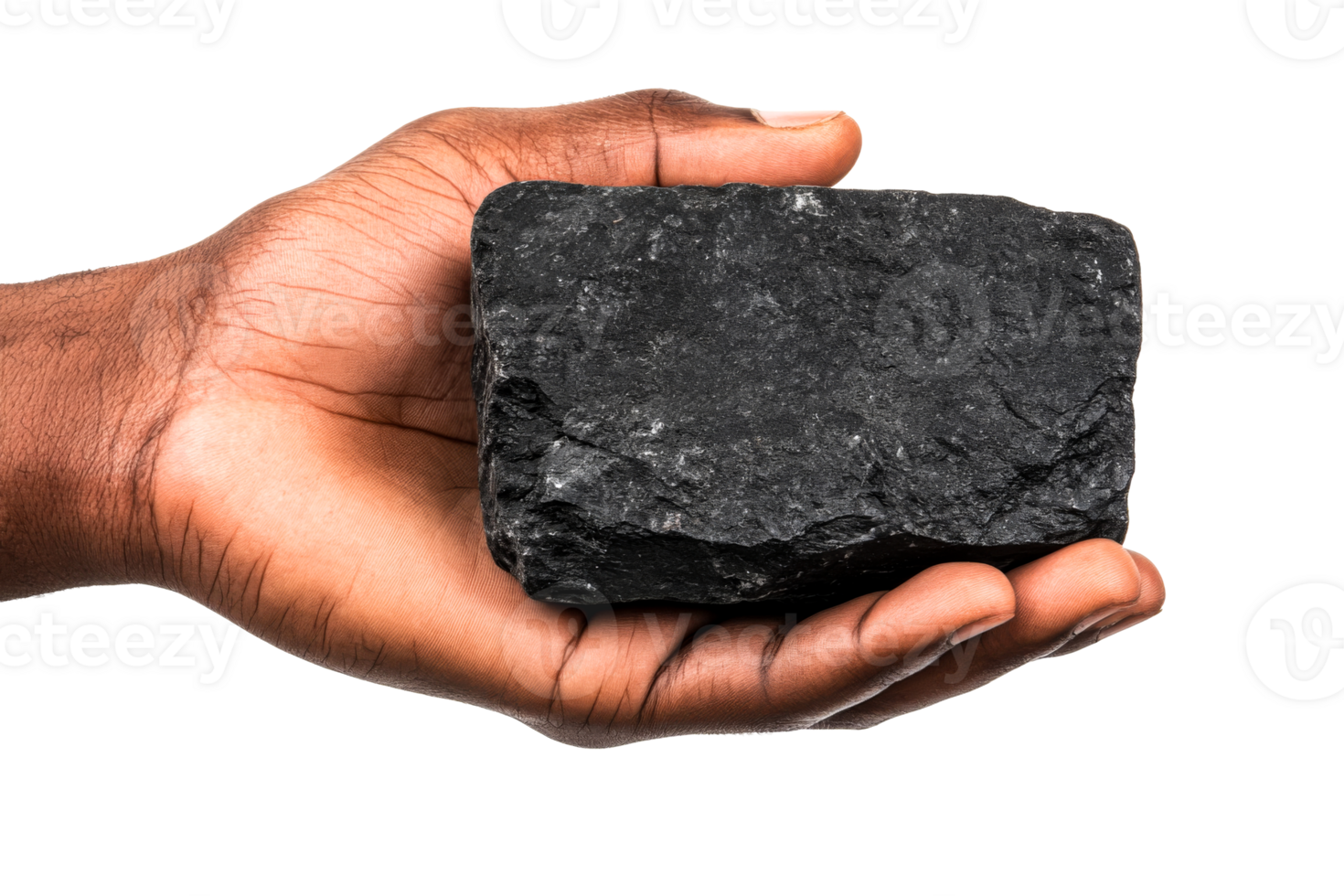 Hand holding a piece of coal against a transparent background png