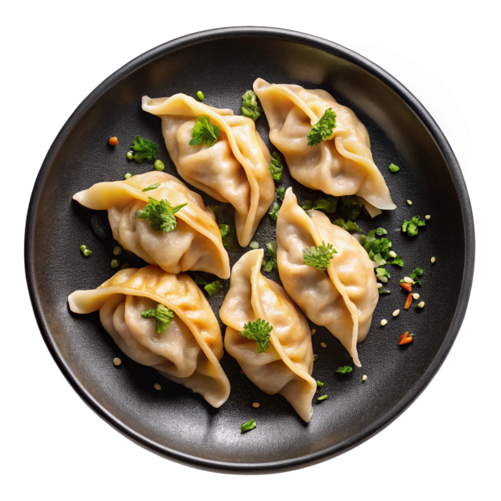 Delicious Steamed Dumplings on a Dark Plate Garnish with Herbs png