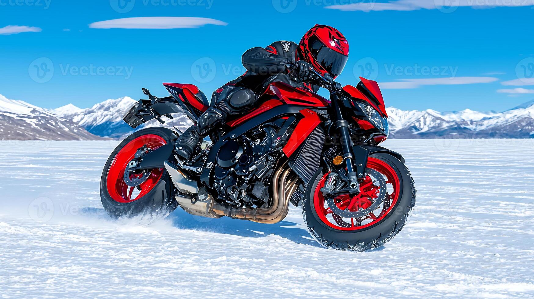 Red Motorbike Rider on Snowy Mountain Pass photo