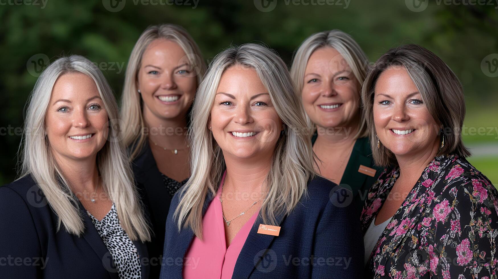 Portrait of Five Confident Businesswomen Smiling Outdoors photo