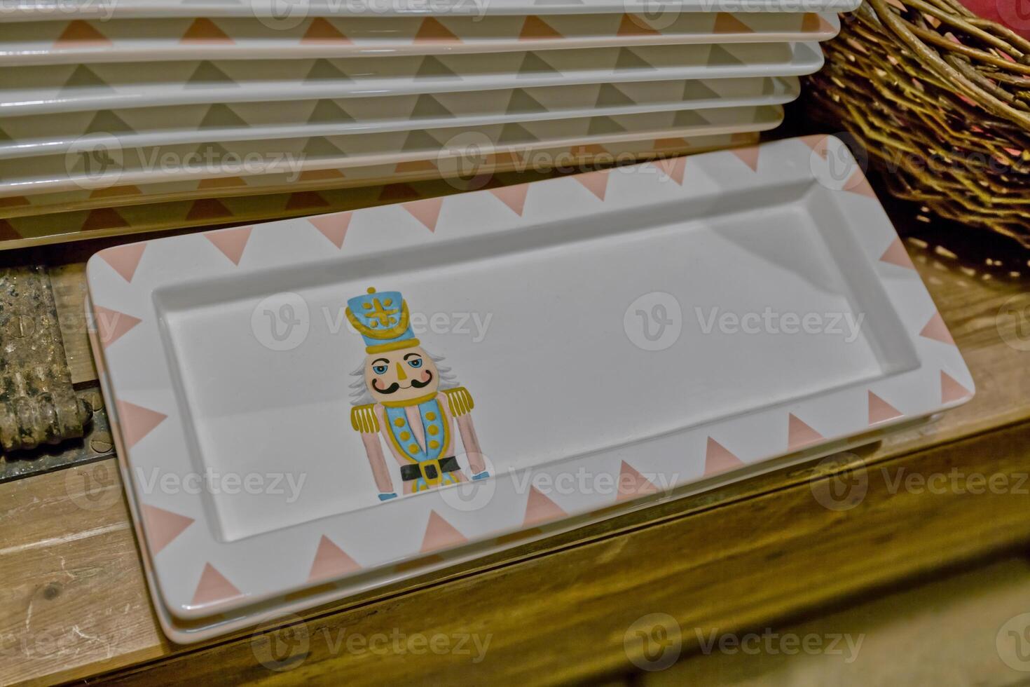 Ceramic Plate with Nutcracker Design and Geometric Border photo