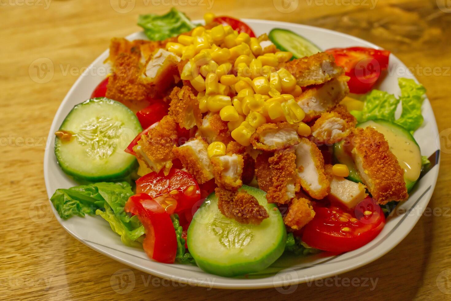 Crispy Chicken Salad with Corn and Fresh Vegetables photo