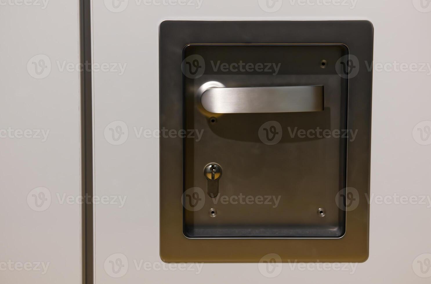 Close-Up of Metallic Door Handle and Lock photo
