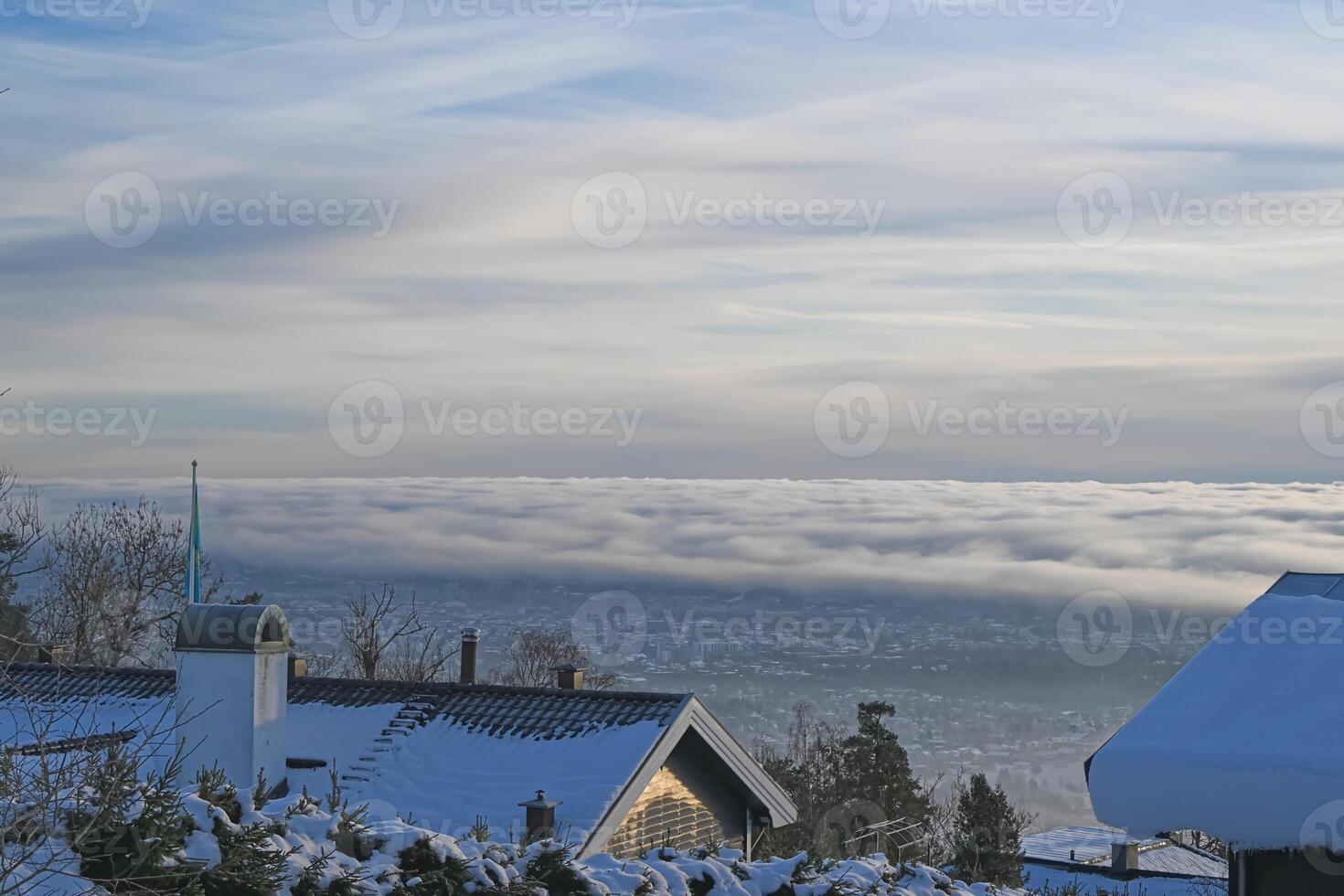 Winter Landscape with Snow and Cloud Cover photo