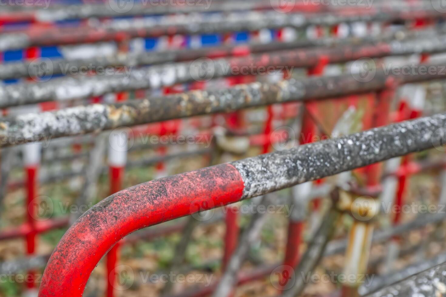 Weathered Red and White Metal Railings photo