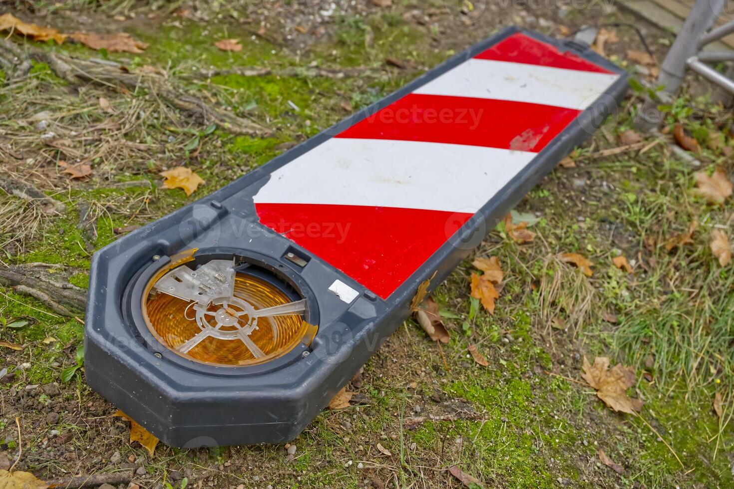 Fallen Traffic Barrier with Amber Light photo