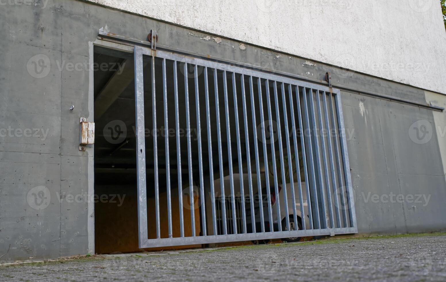 Open Metal Gate at Parking Garage Entrance photo