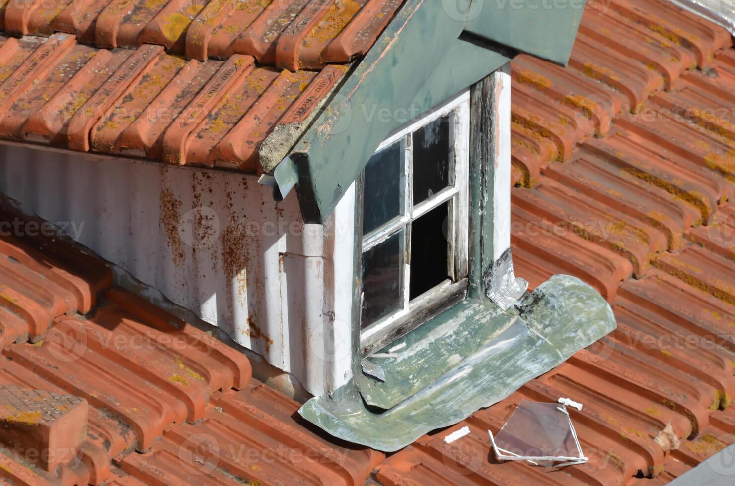 Weathered Rooftop with Dormer Window photo