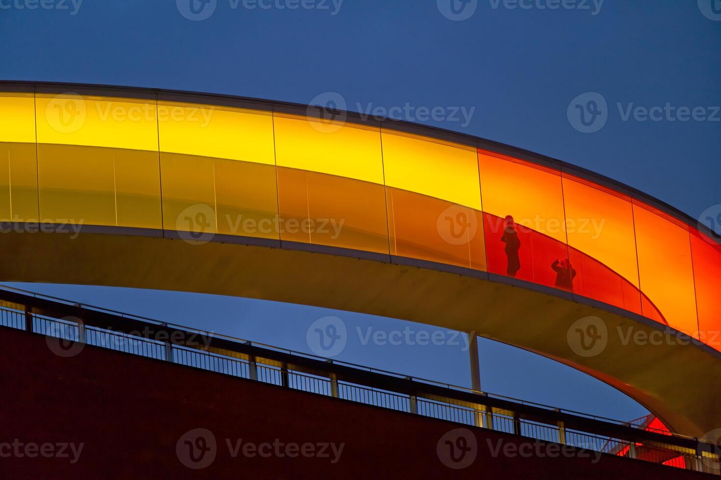 Vibrant Curved Bridge at Twilight photo