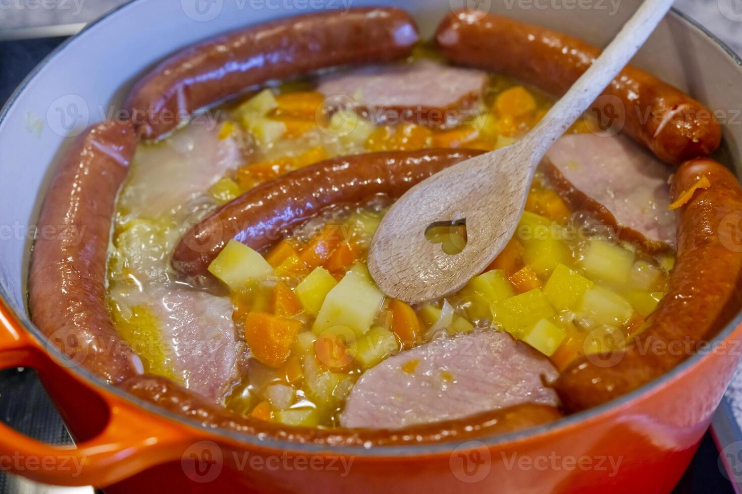 Hearty Sausage and turnip Stew in a Pot photo