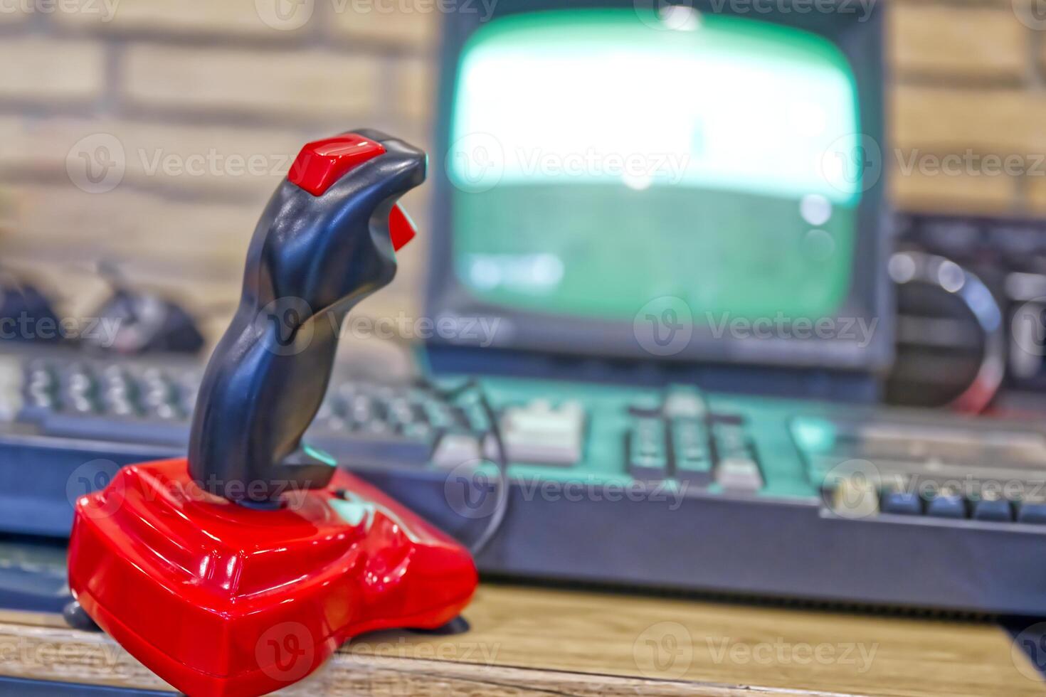 Vintage Joystick Controller with CRT Monitor photo