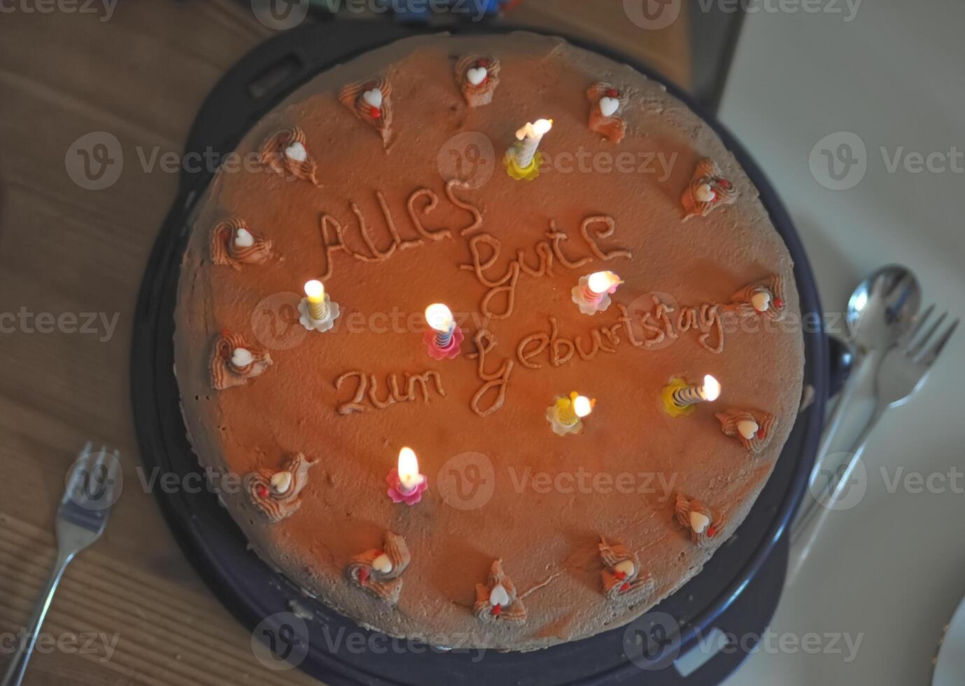 Festive Birthday Cake with Candles photo