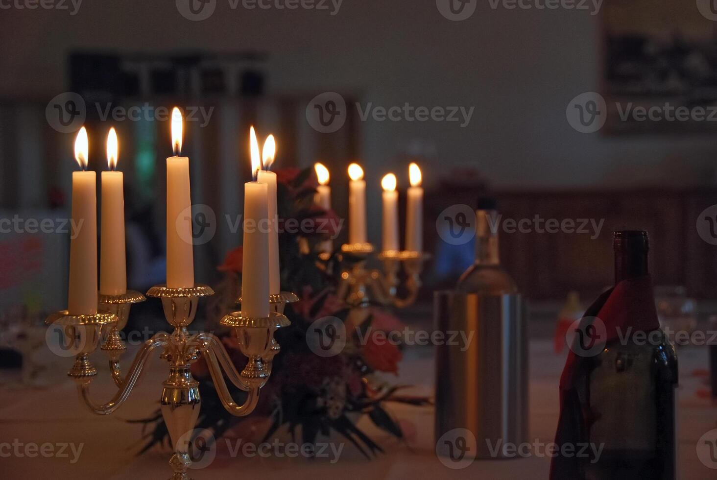 Elegant Dining Table with Candles and Wine photo