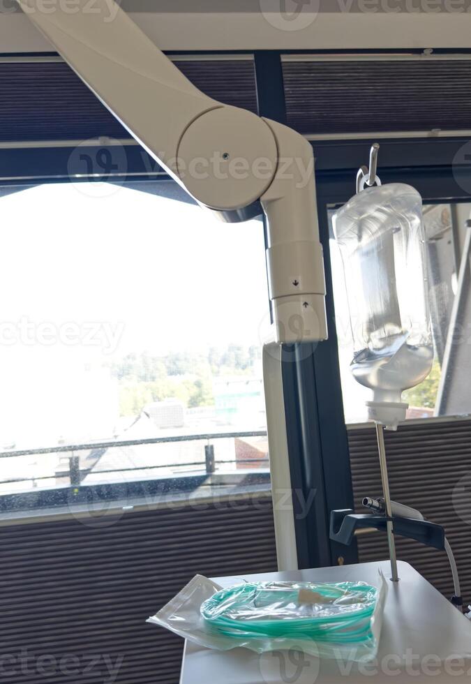 Medical IV Stand with Fluid Bag and Tubing photo