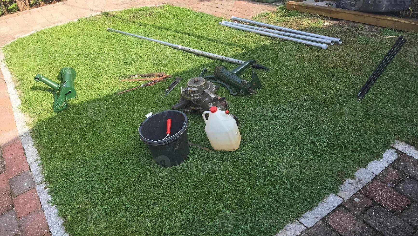 Gardening Tools and Equipment on Grass photo