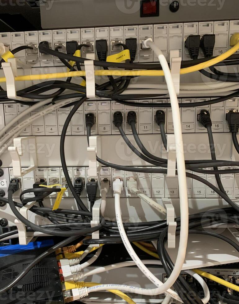 CloseUp of Organized Network Rack with Cables photo